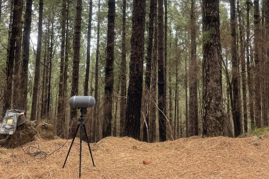 Field recording setup on a hillside